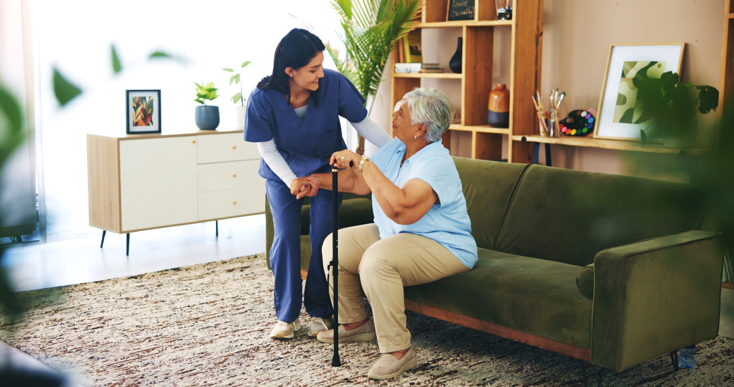 Nurse assisting senior resident in local Wichita nursing home