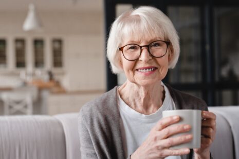 Elderly woman transitioning from assisted living to nursing care with family support in Wichita Ks