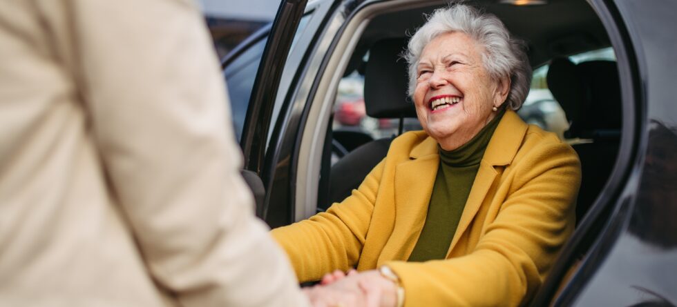 Senior in a car at assisted living community in Wichita Kansas with Keepsake Kottage